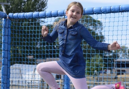 girl jumping on trampoline